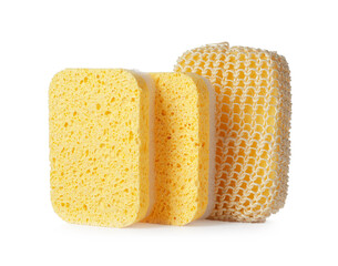 Different bath sponges on white background