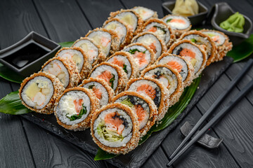 Set of hot sushi rolls in tempura.
