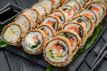 Set of hot sushi rolls in tempura.