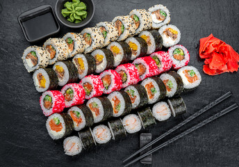 Set of sushi rolls with fresh fish.