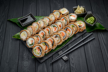 Set of hot sushi rolls in tempura.