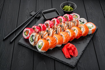 Set of sushi rolls with fresh fish.