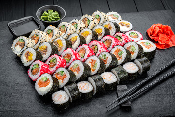 Set of sushi rolls with fresh fish.
