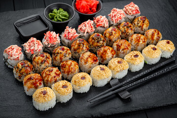 Set of sushi rolls with fresh fish.