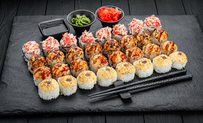 Set of sushi rolls with fresh fish.