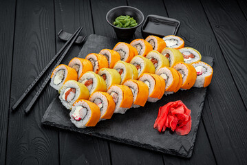 Set of sushi rolls with fresh fish.