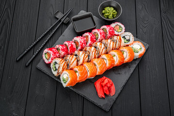 Set of sushi rolls with fresh fish.