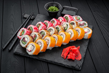 Set of sushi rolls with fresh fish.