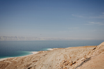 Dead Sea Jordan. Coast of the Dead Sea on a clear sunny day. Turquoise color of water.
