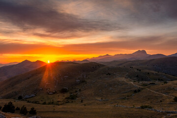 Sunset with sunburst over Gran Sasso National Park, Abruzzo Italy