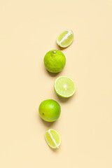 Whole and cut ripe bergamot fruits on color background
