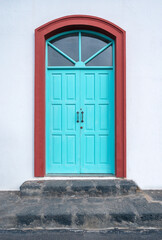 Wooden door with stone frame, rural tourism