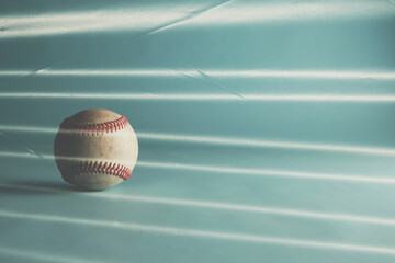 Light streaks with vintage style baseball background for old sport.