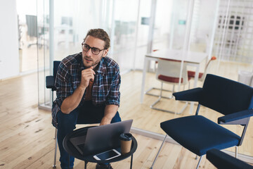 Millennial caucasian business man work in office