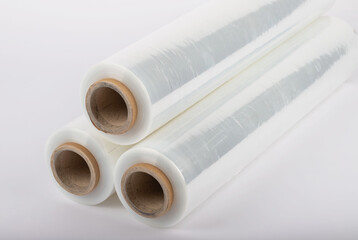 Roll of plastic stretch film with clear wrap. It stands in an isolated environment. It is used in...