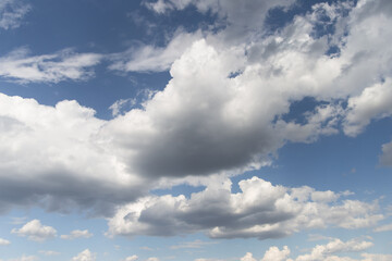 Naklejka na ściany i meble Clouds are white in the blue sky, clear day