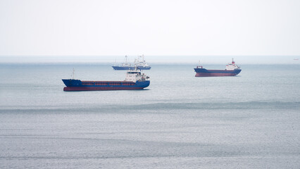 Tankers are in line for loading in the waters of the cargo port. Copy space.