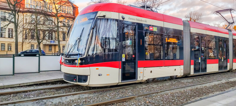 Gdansk, Poland - March 8, 2022: Tram with Polish and Ukraine flags for solidarity with Ukraine after Russian invasion.