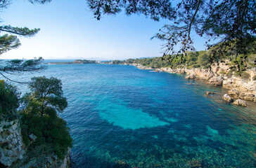 Blue mediterranean sea, and billionaire's bay on the `Cap d'Antibes`, Antibes cape, French riviera , France, selective focus