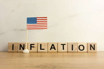 USA flag and wooden blocks with text inflation