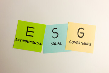 ESG environmental social governance acronym handwritten on sticky notes