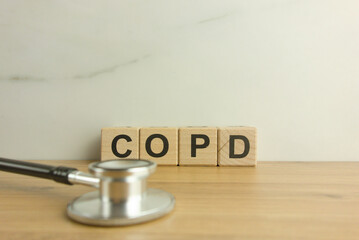 COPD chronic obstructive pulmonary disease acronym from wooden blocks with stethoscope