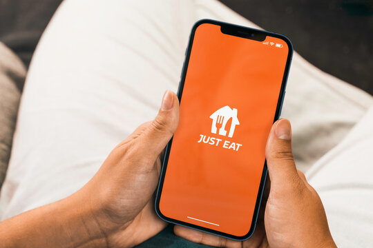 Female Hand Holding A Smartphone With Just Eat Delivery App On The Screen. Rio De Janeiro, RJ, Brazil. March 2022