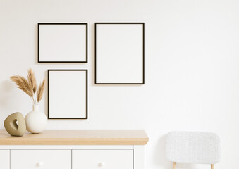 Boho Style Vertical and Horizontal 8x10 three Black Frames mockup. Vertical Black frame on a wall with plant in a vase and cupboard and chair. 3d rendering.