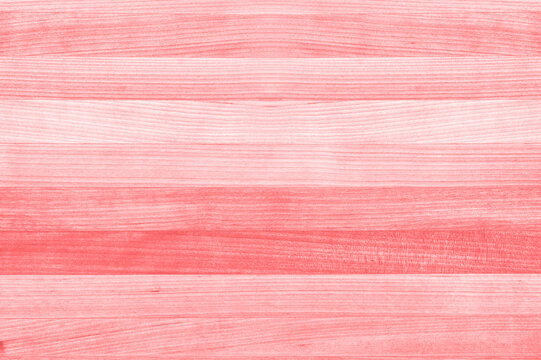 Coral pink, salmon and peach color wood background texture