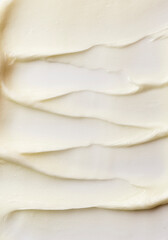 Thick creamy texture background. Smooth lotion or cream pattern of texture. Macro shot. 