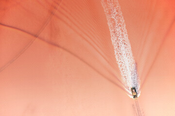 Extraction of salt on the pink lake using a special train