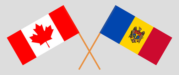 Crossed flags of Canada and Moldova. Official colors. Correct proportion