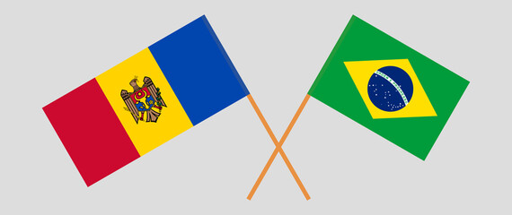 Crossed flags of Moldova and Brazil. Official colors. Correct proportion