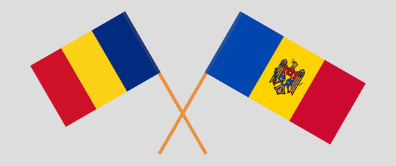 Crossed flags of Romania and Moldova. Official colors. Correct proportion