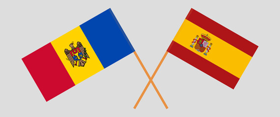 Crossed flags of Moldova and Spain. Official colors. Correct proportion