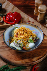 Salad of fresh vegetables with finely chopped potatoes in breadcrumbs. Top view