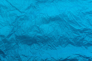 Texture or background of vintage blue crumpled paper