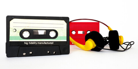 Vintage Cassette tape and headphones isolated on a white background