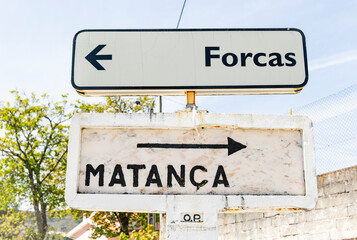 traffic signpost pointing the way to Forcas and Matança (Magueija), Lamego municipality, district of Viseu, Portugal - obrazy, fototapety, plakaty