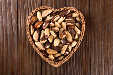 Brazil nuts on wooden background