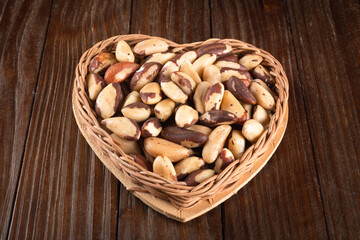 Brazil nuts on wooden background