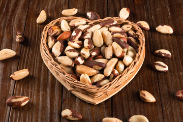 Brazil nuts on wooden background