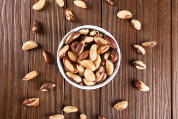 Brazil nuts on wooden background