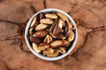 Brazil nuts on wooden background