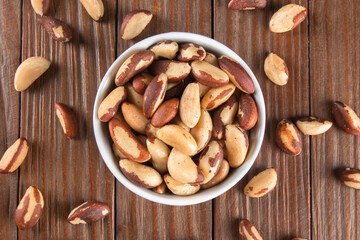 Brazil nuts on wooden background