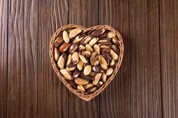 Brazil nuts on wooden background