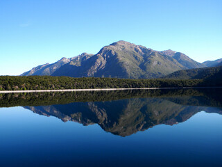 Reflection of the Andes mountains on a lake in Patagonia, Argentina. Los alerces national park