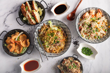 Aerial view of Japanese food served on the restaurant table