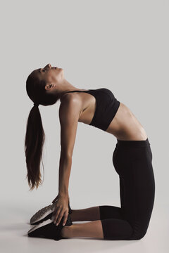 Fitness woman doing stretching exercises