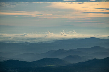 colorful sunrise at the highest peak of Mount Si Kunir, Mount Dieng, Wonosobo, Indonesia 